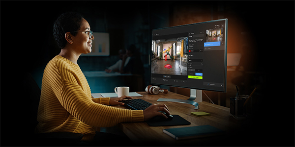 Lifestyle image of desktop PC with editing software on-screen