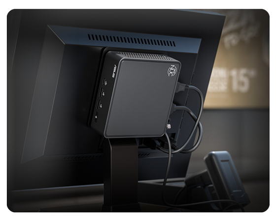An ASUS NUC 15 Pro VESA mounted to the back of a monitor