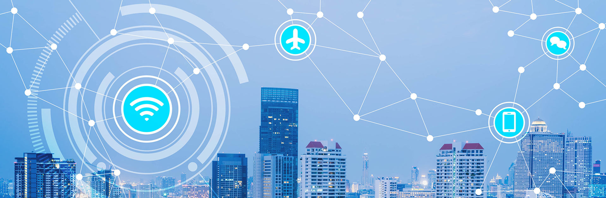 Cityscape with an overaid graphic of interconnected devices