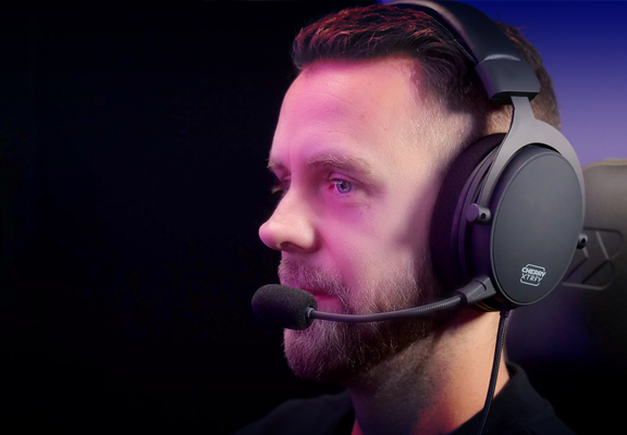 Gamer wearing H2 wireless headset so showcase its design