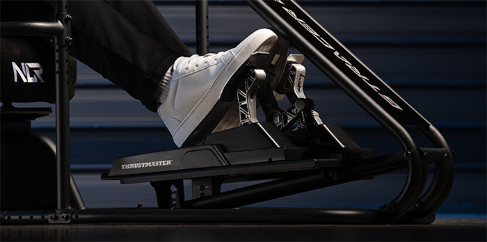 Close up image of persons feet on the pedals