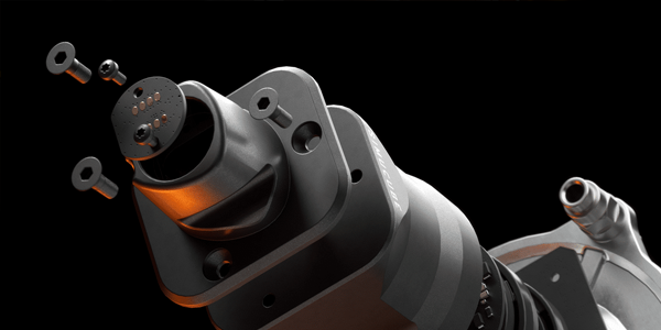Simucube 3 Pro wheelbase with bolts illustrated around the wheelbase to highlight its build quality.