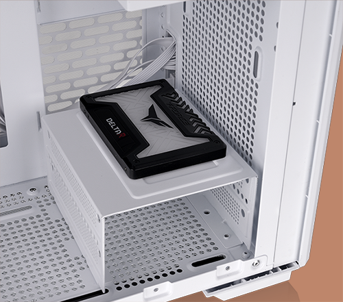 Close up image of an SSD drive on top of the HDD drive cage
