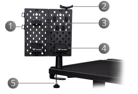 Pegboard clamped to the desk