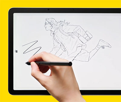 someone drawing on the Wacom MovinkPad 11 portable drawing tablet