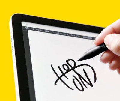 someone signing on the Wacom MovinkPad 11 portable drawing tablet