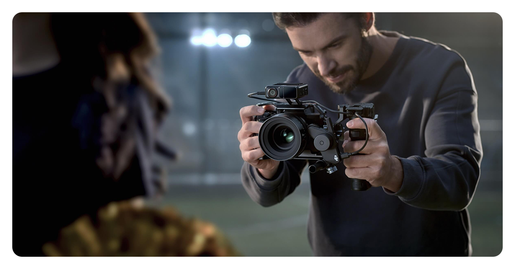 someone using a dji focus pro setup with their camera