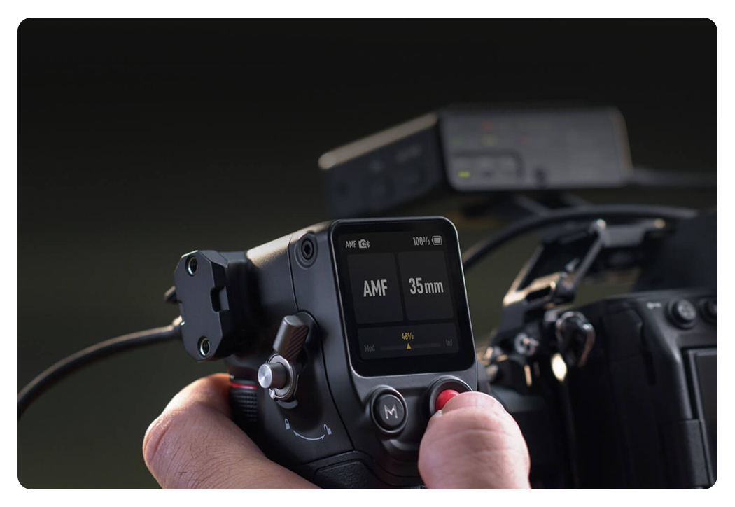 close up of someone using the dji focus pro grip
