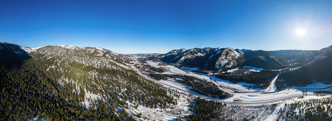 dji mini 3 180 degree sample shot of a snowy mountain