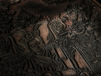 Close up image of wood carving