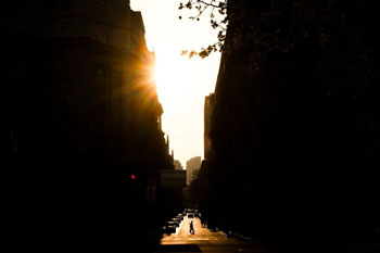 Sample image of street at sunset lined with tall buildings