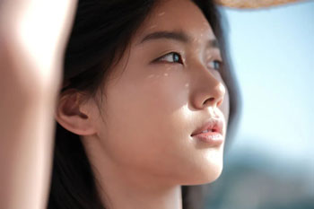Close up portrait of female model with smooth skin effect active on Fujifilm X-E5