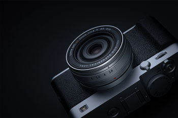 Fujifilm X-E5 with XF23mm F2.8 R WR lens on black background