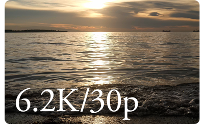 Fujifilm X100VI sample image of sunset lit lake shore with light pouring over the water