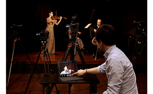 Videographer using Remote record functionality to record multiple cameras