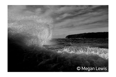 Fuji XT5 Black and white sample image of waves crashing against rocks and splashing
