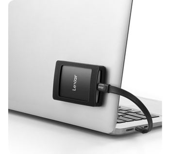 Lexar SL500M attached to back of macbook pro laptop display