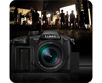 close up of the panasonic lumix gh5m2 mirrorless camera with a film studio background