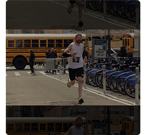 image of man running along newyork street with cycle bank in background