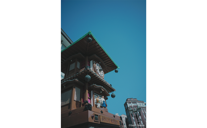 LUMIX S9 and S 26mm Sample Image of temple clock tower against clear blue sky