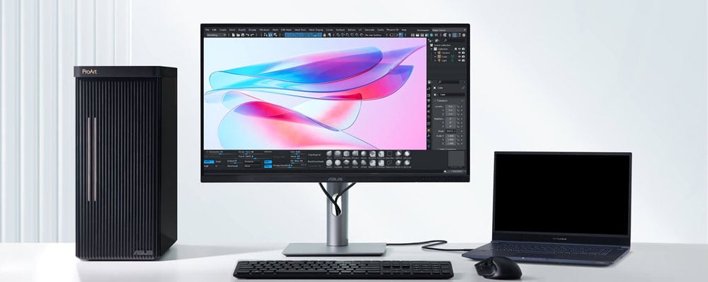 ASUS ProArt monitor connected to a laptop and pc switching between displays