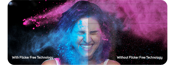 photograph of woman hit with blue and pink coloured paint pigments showing ASUS flicker Free technology comparison