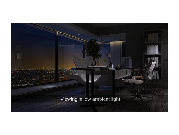 image of modern office space at night over looking a city