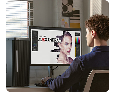 photographer editing an image on a proart display