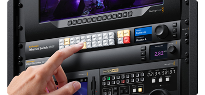 Image of person pressing control buttons on blackmagic Ethernet Switch 360p in rackmount with Cloud Store Max and Smart View G3