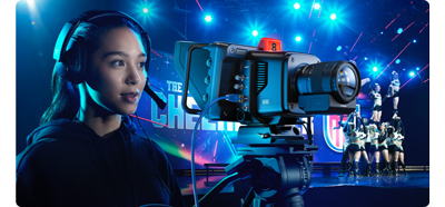 Image of female camera operator using blackmagic Studio Camera 4K Pro G2 to capture live dance competition