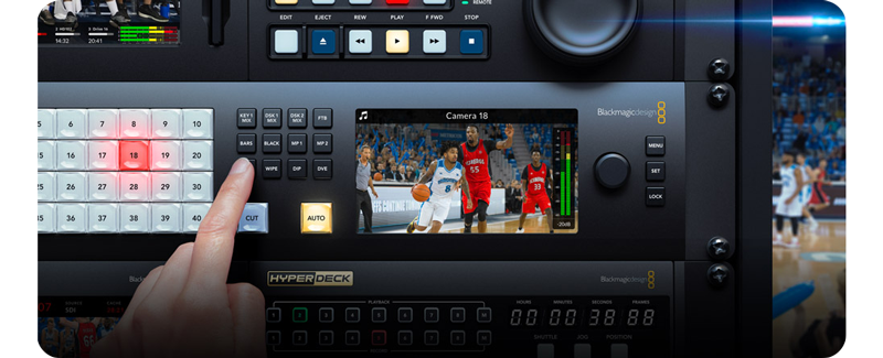 Image of person pressing front controls on Blackmagic ATEM 4 M/E Constellation 4K Production Switcher capturing NBA basketball game