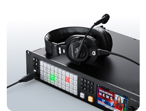 Image of Talkback intercom headset on top of Blackmagic ATEM 4 M/E Constellation 4K Production Switcher