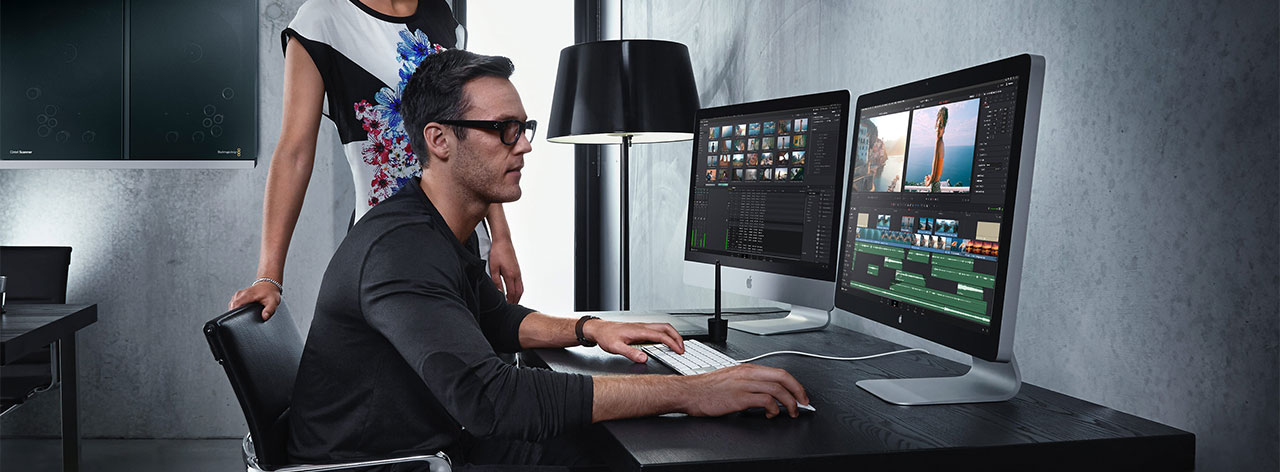 editor working with DaVinci Resolve on Mac editing film footage