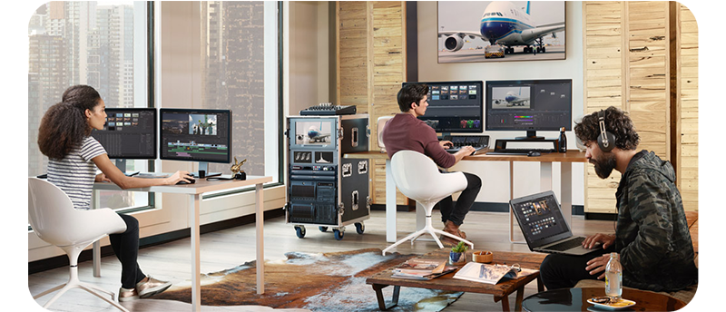 creatives video editing in a studio space using DaVinci Resolve and Cloud Store Mini