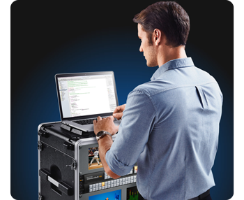 image of person working with laptop on mobile rackmount trolley