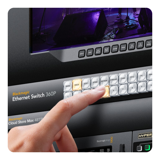 close up of someone pressing the buttons on the blackmagic ethernet switch