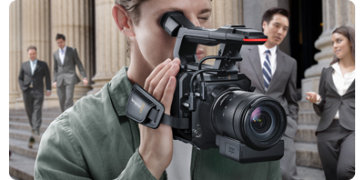 videographer using blackmagic PYXIS with Pro Handle and Grip as Broadcast Camera