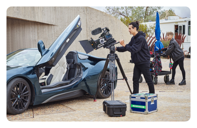 blackmagic pyxis 12k being used to film a blue car on set