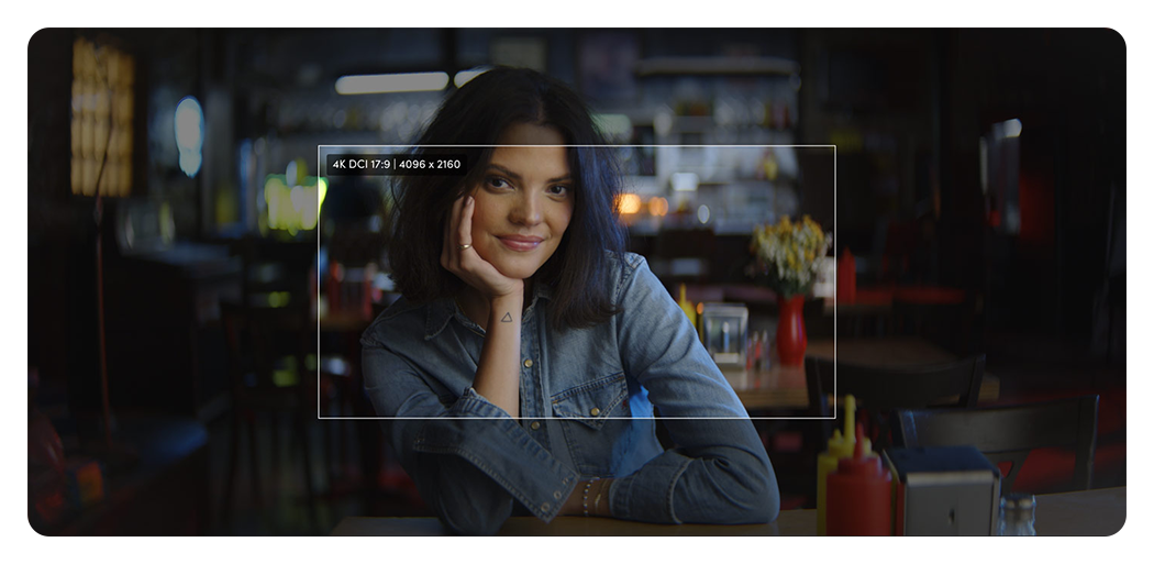sample image of a woman in a cafe showing blackmagic pyxis 12k format size