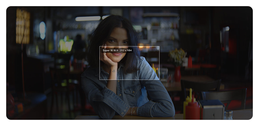 sample image of a woman in a cafe showing blackmagic pyxis 12k format size