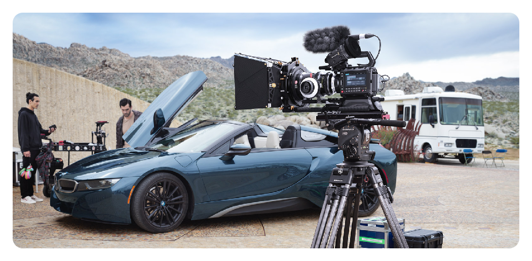 blackmagic pyxis 6k being used on set with a blue sports car