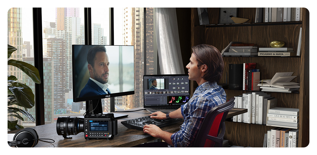 someone editing footage from the blackmagic pyxis 12k at a desk