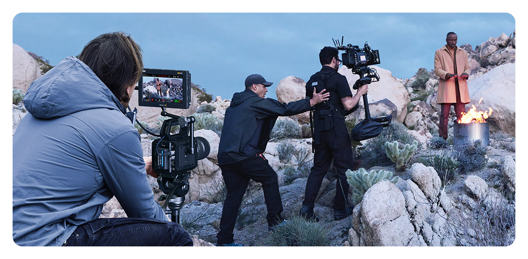 blackmagic pyxis 6k being used to film a man near a fire