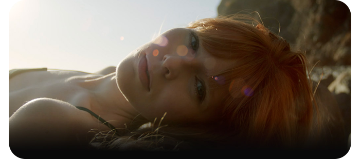 example image of a woman lay down looking into the blackmagic ursa broadcast g2