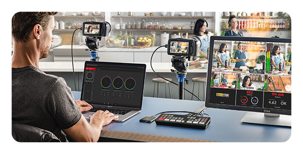 someone controlling cameras using the blackmagic atem