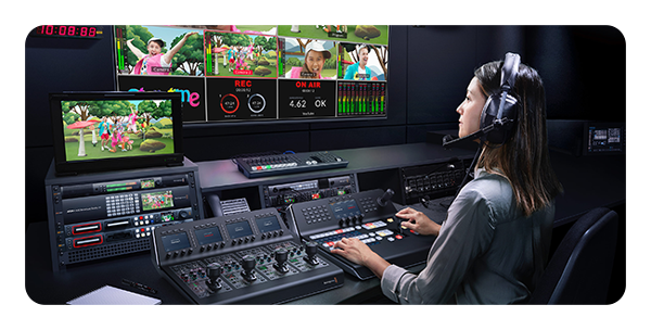 somone using the blackmagic atem in a control room