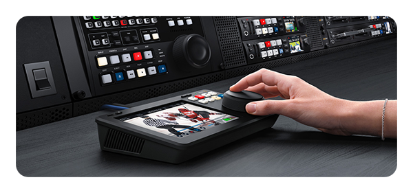 someone adjusting the dial on the Blackmagic hyperdeck shuttle 4k pro