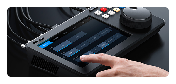 someone touching the screen on the Blackmagic hyperdeck shuttle 4k pro