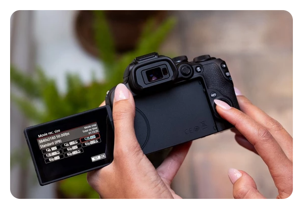 close up of the canon r10 showing the viewfinder pulled out to the side
