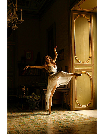 sample image of a woman dancing in a corridor taken on the canon r6 camera